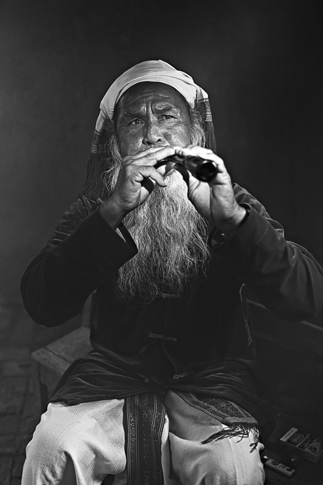 Old man with Saranai trumpet