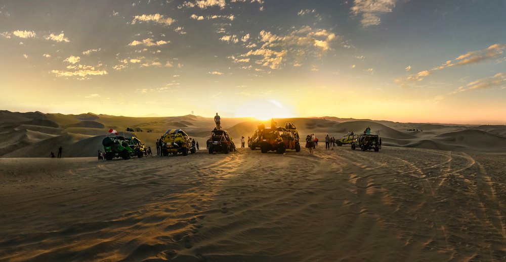 Dune buggies  at sunset