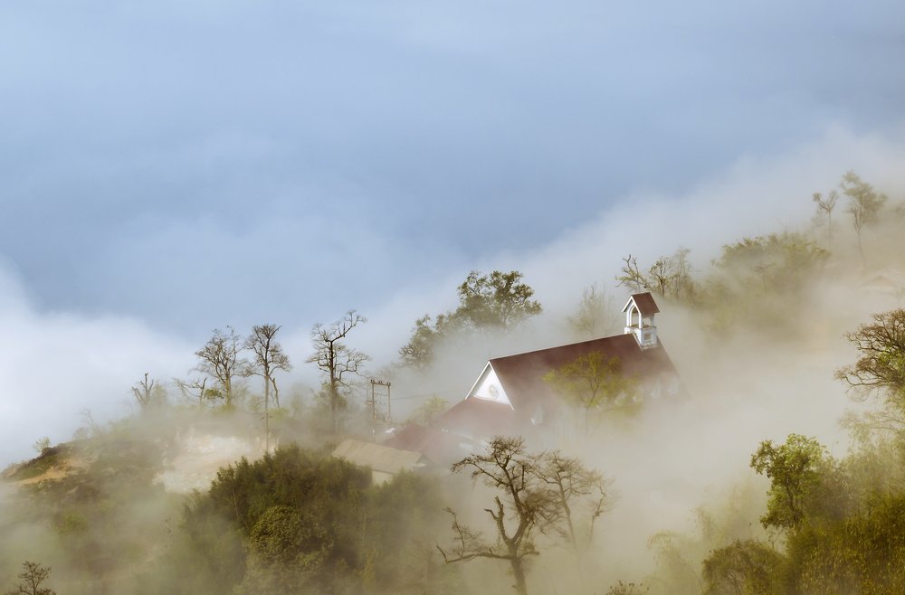 the church in clouds