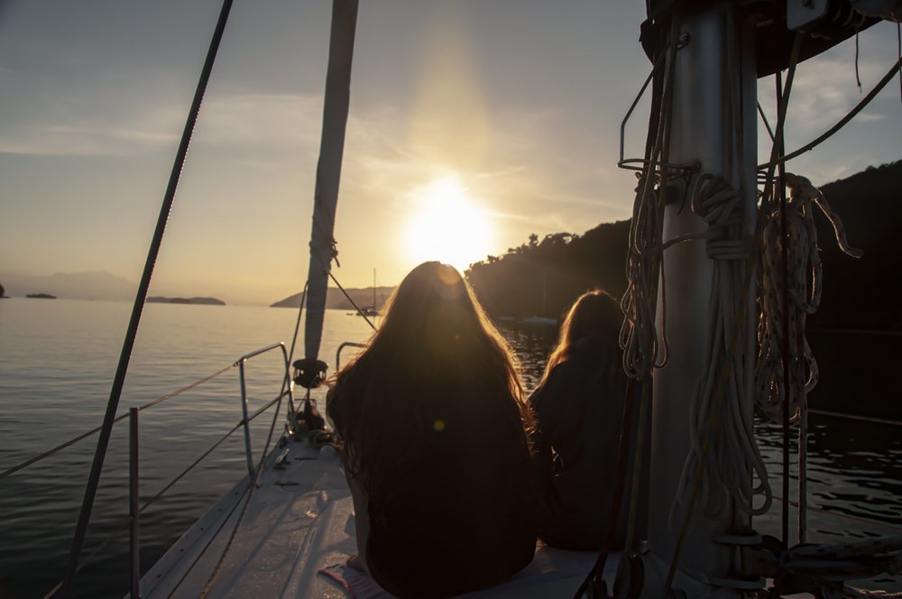 Two girls at the sunrise
