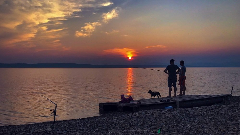 fishermen on the lake