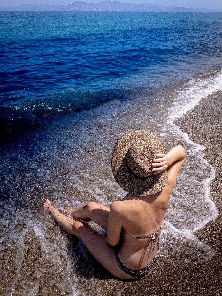 Beach, water and the sun.