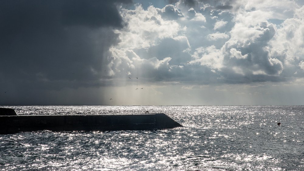 О неизбежности солнца после дождя