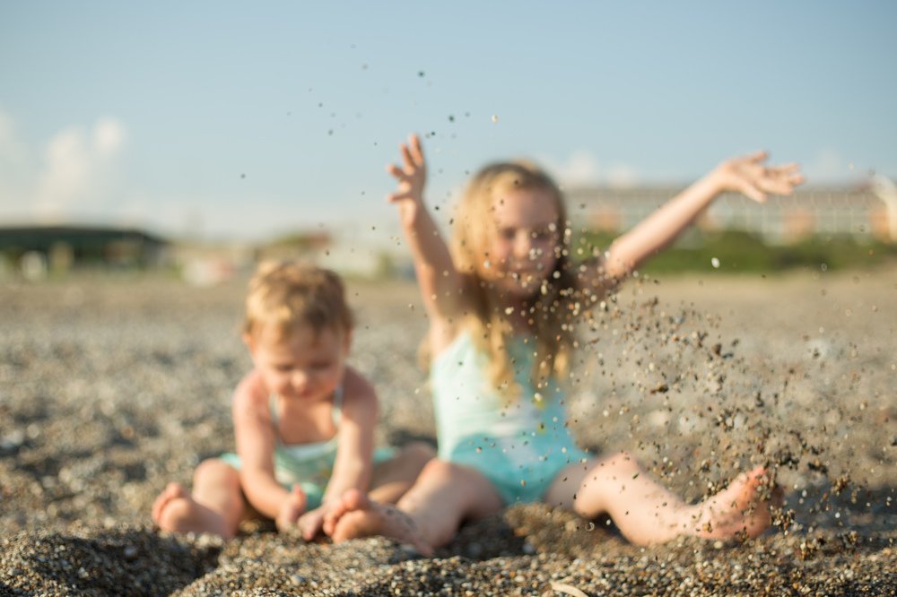 Sisters and sand