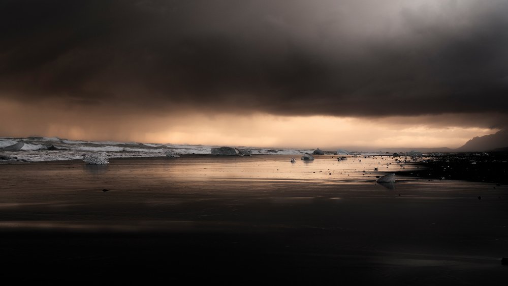 Deacon of dark river (Diamond beach in iceland)