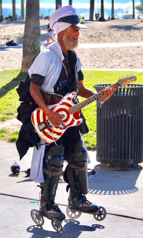 Rollerblading Street Guitarist