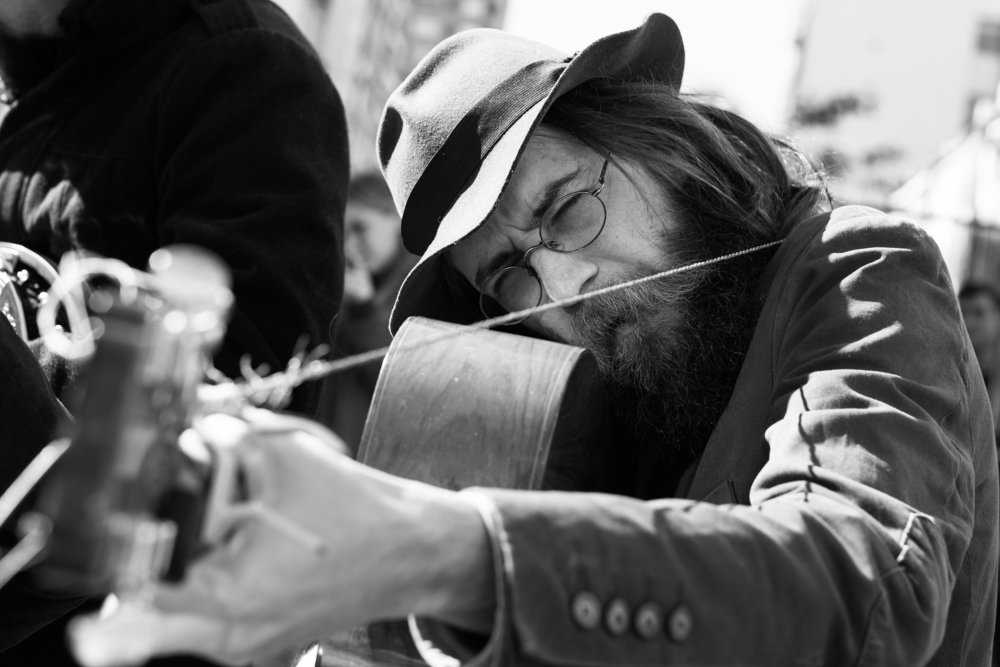 The acoustic guitarist.