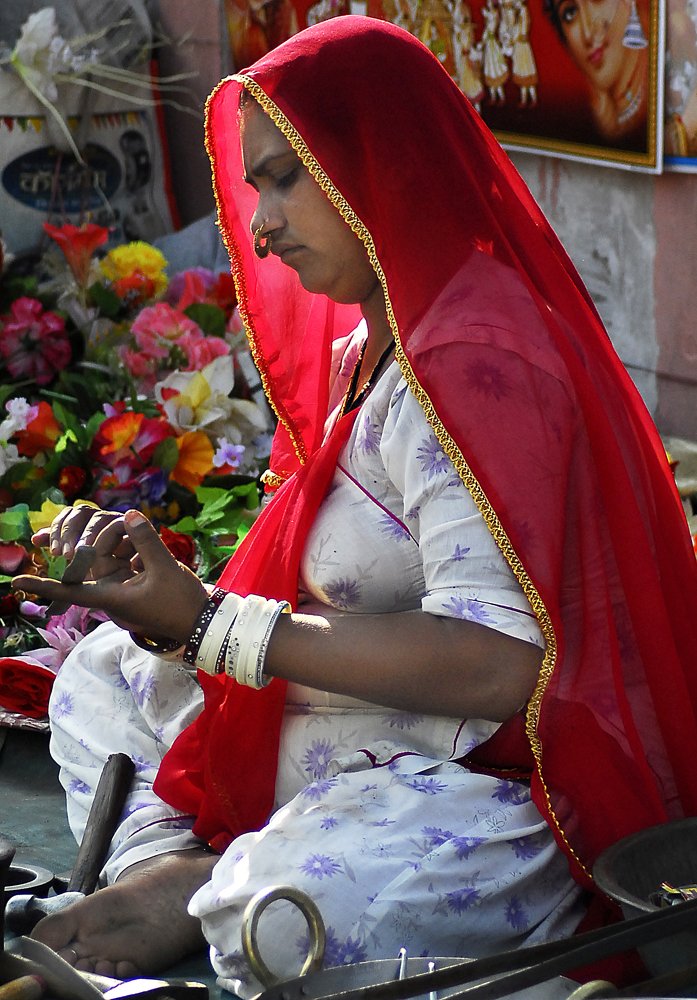 Lady Selling Metal Items