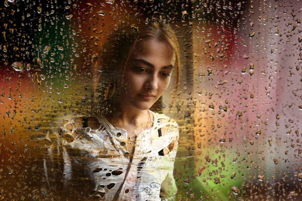 Inabat, at the window