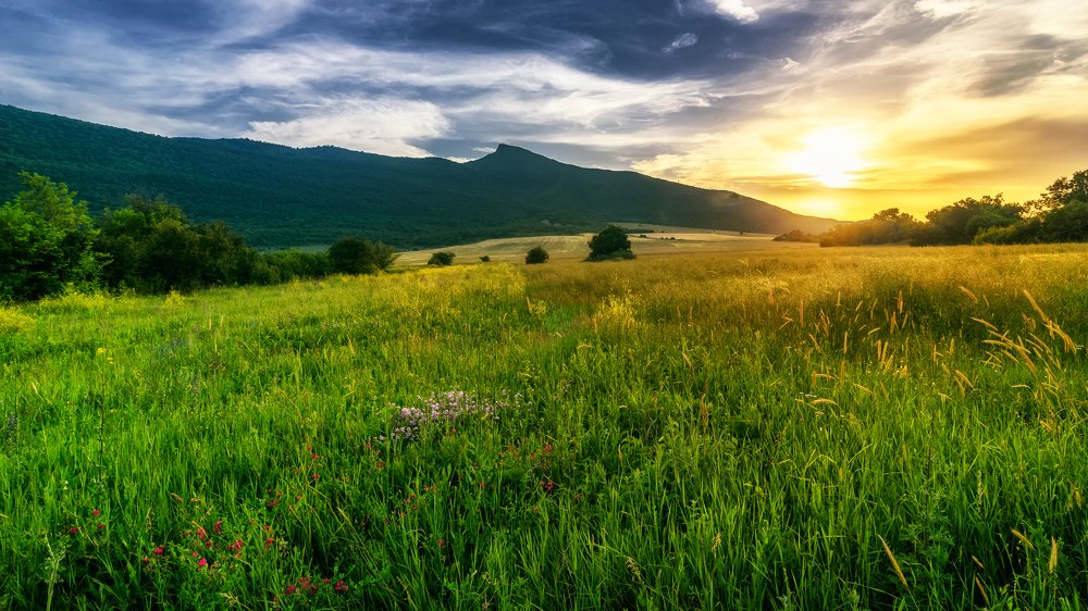 Sunset at the foot of the mountain