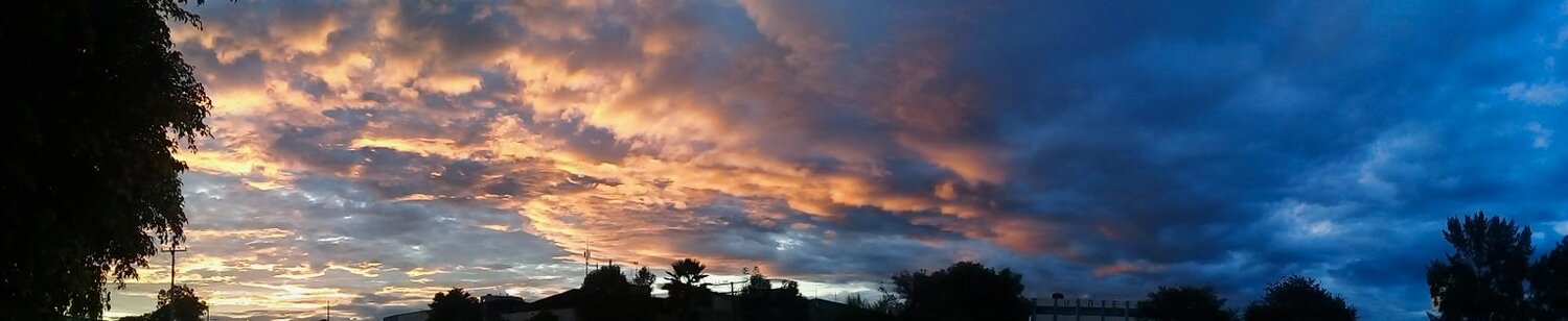 Sunrise against night