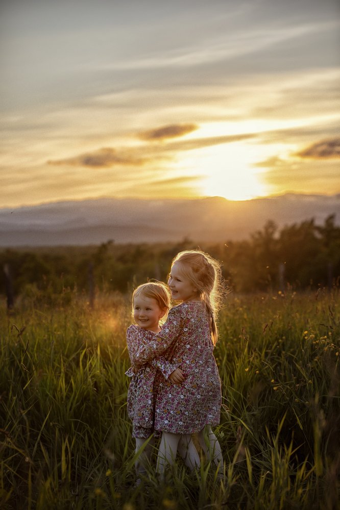 Litle sisters at sunset