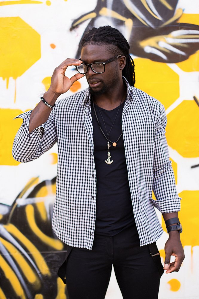 Monochrome set against the colorful wall