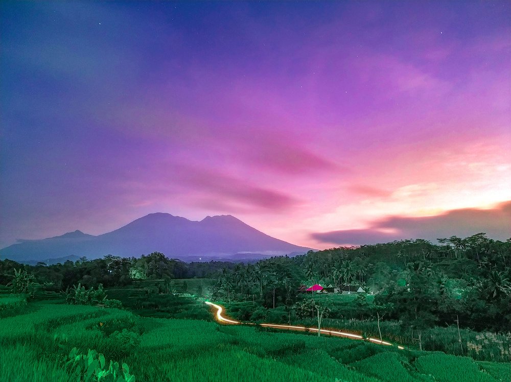 Beauty sunrise moment at ricefield gogoniti with view Kawi Mountain