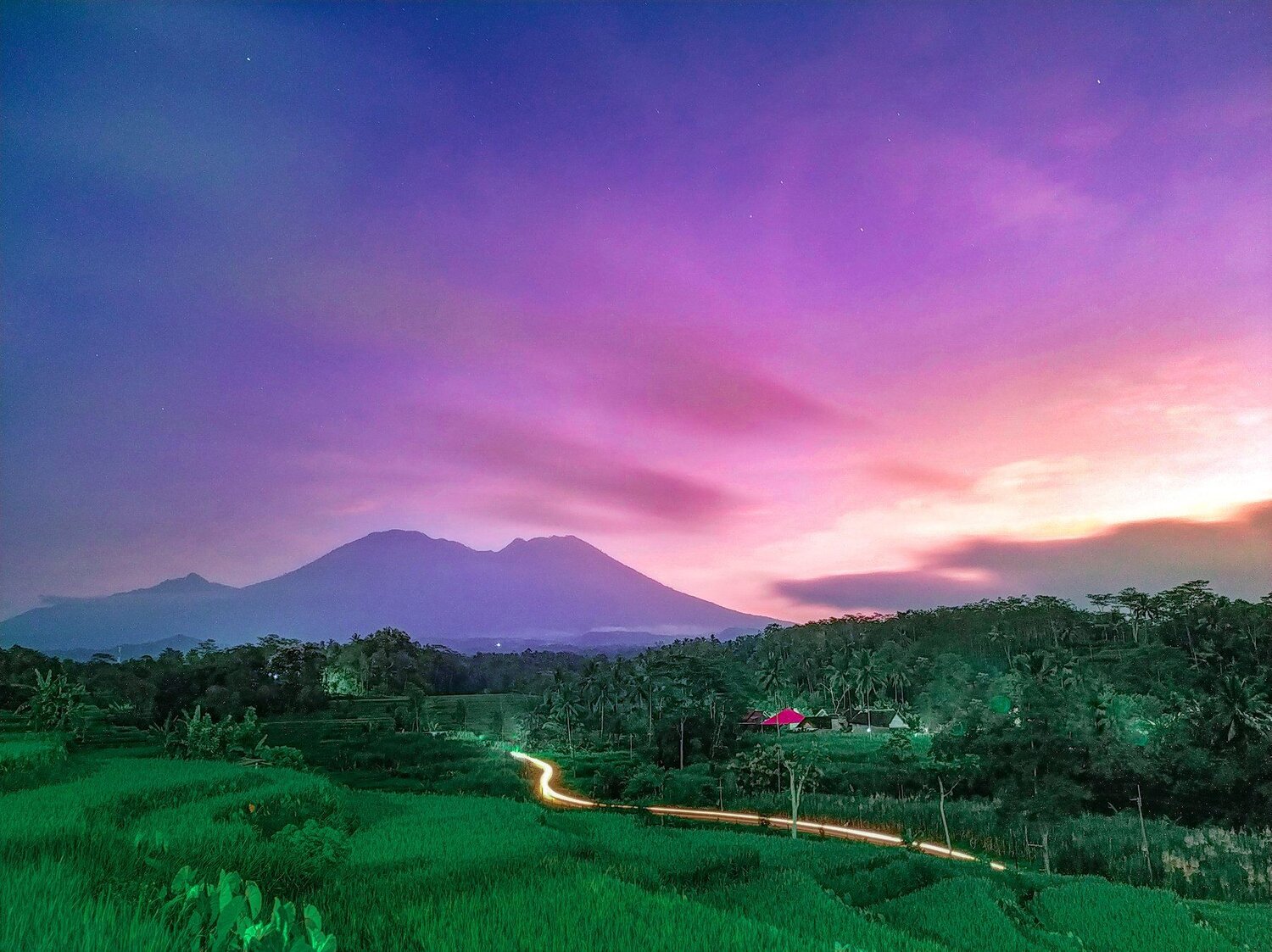 Beauty sunrise moment at ricefield gogoniti with view Kawi Mountain
