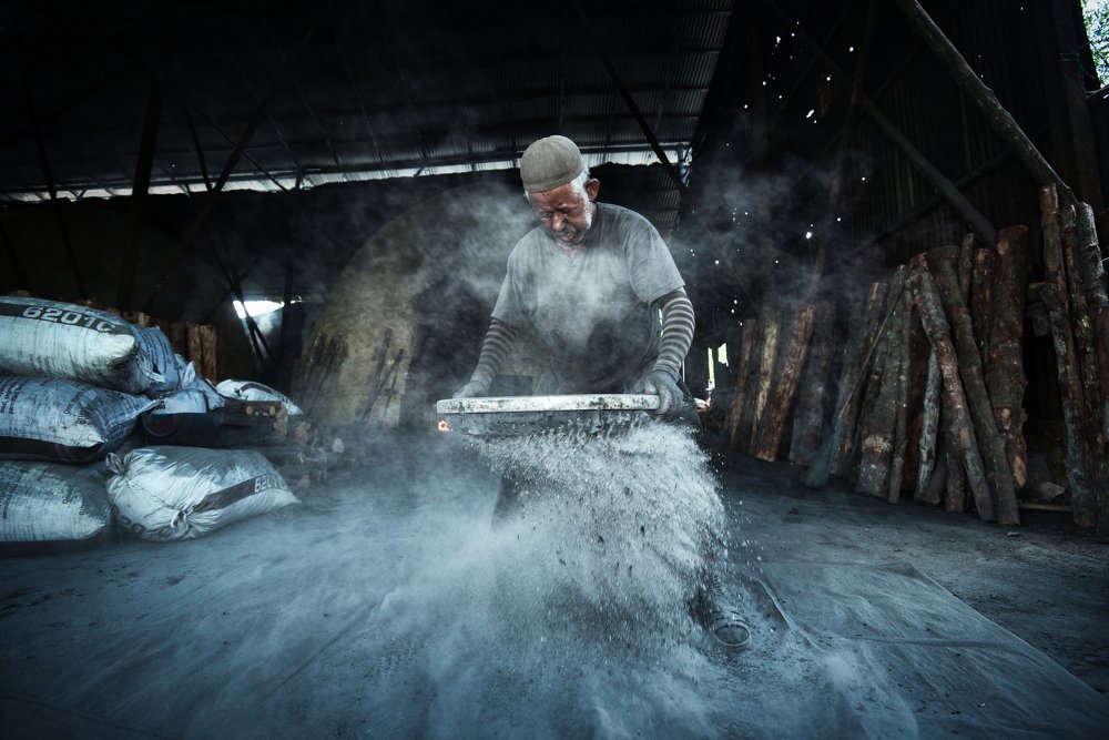 Man at work in Charcoal factory