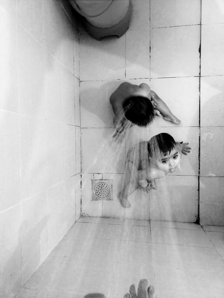 Babies taking shower