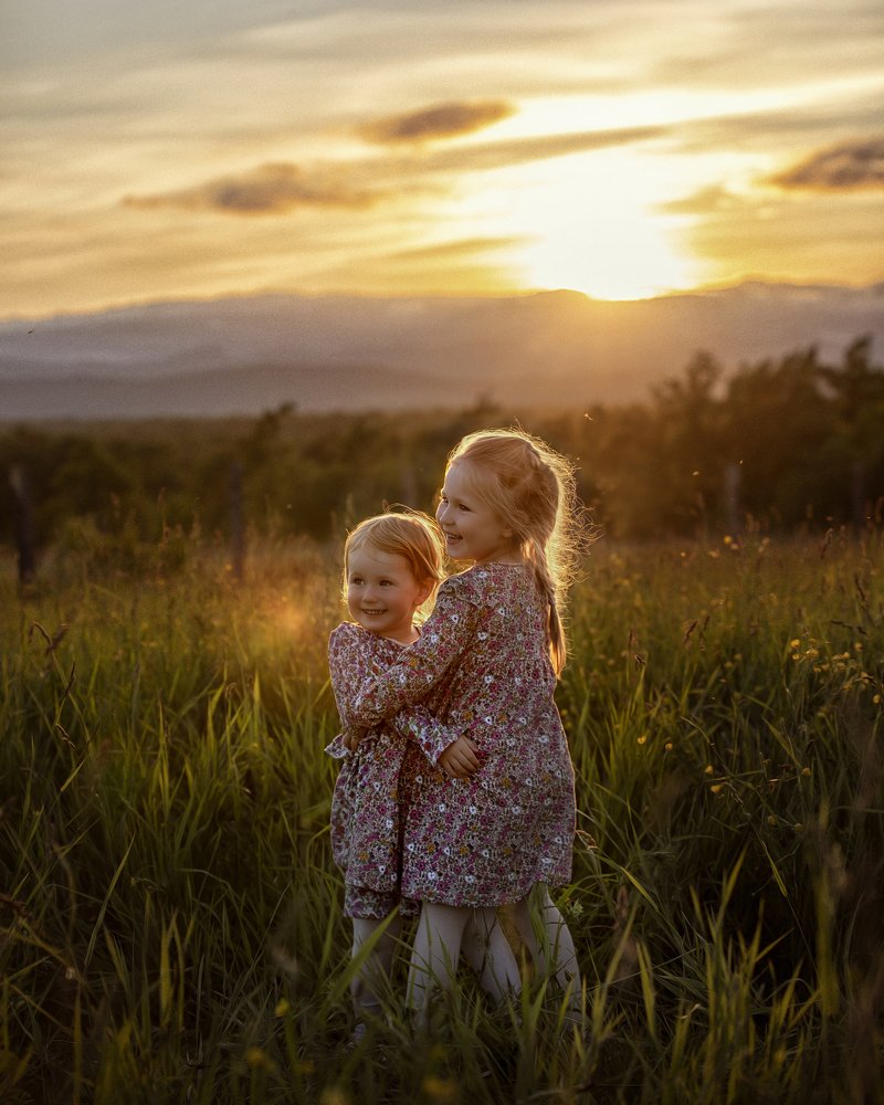 Litle sisters at sunset