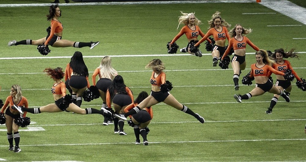 gymnastic splits performed by cheerleaders