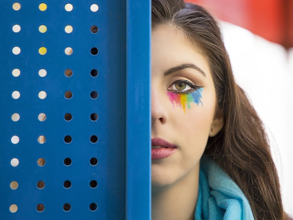 Young Woman with Colorful Makeup
