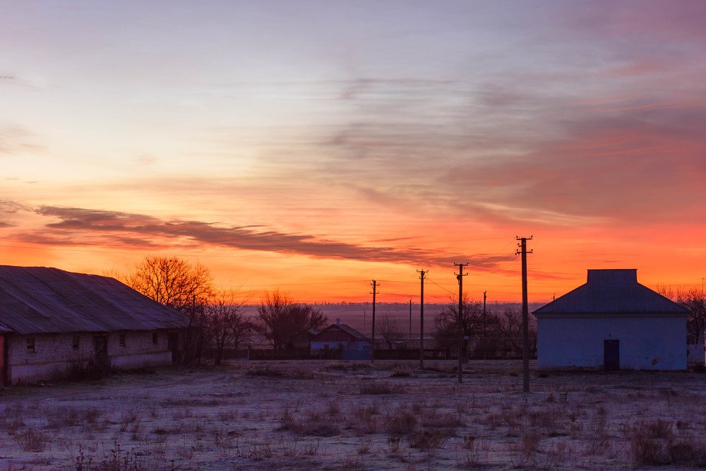 Winter Dawn over an abandoned village