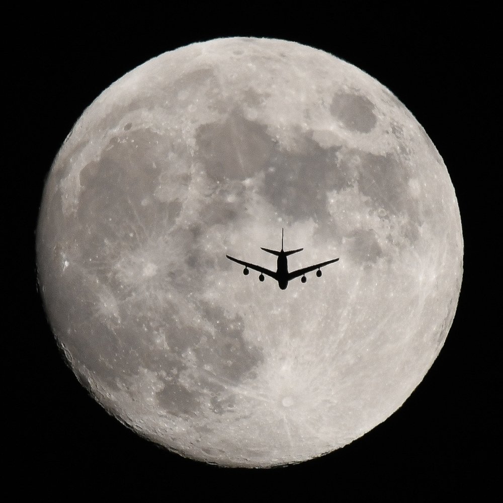 Plane and the moon