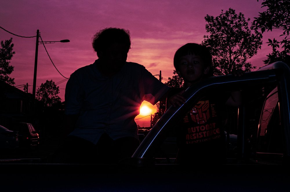 Dad and son purple moment