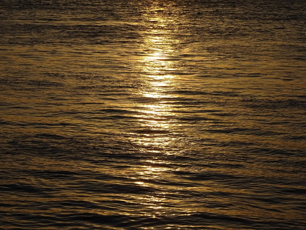 The yellow path of the sunrise