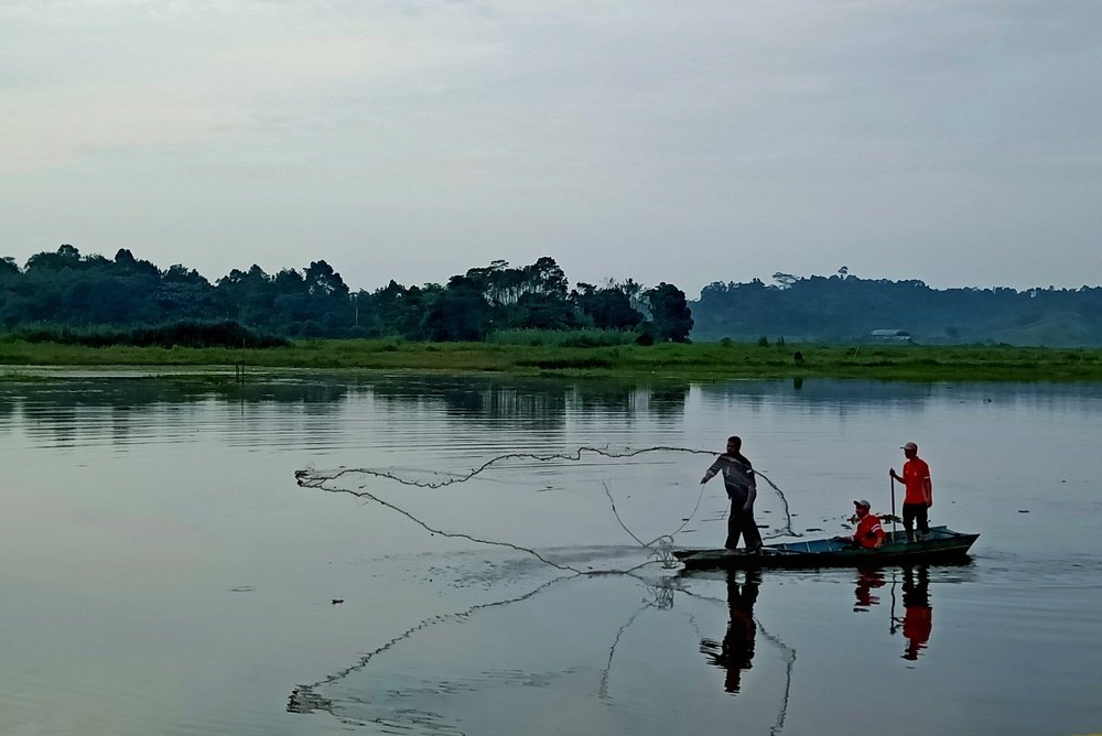 Two people are fishing