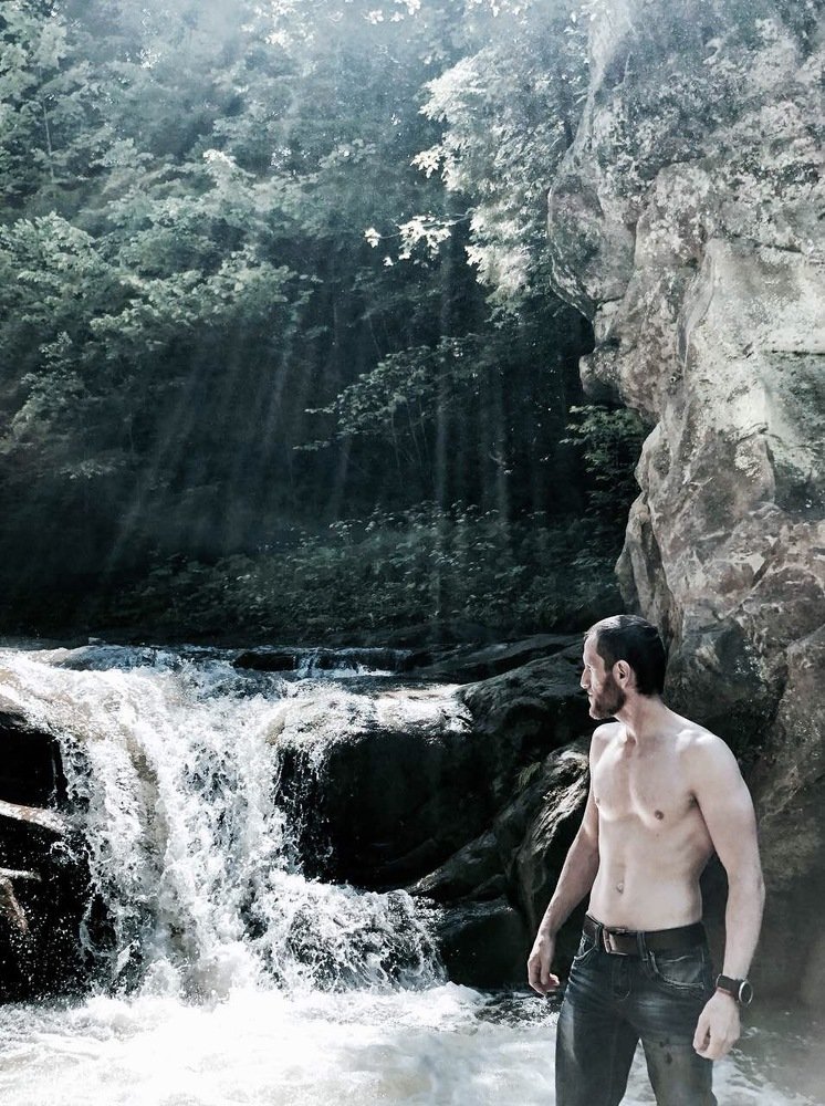 young mushina near the waterfall