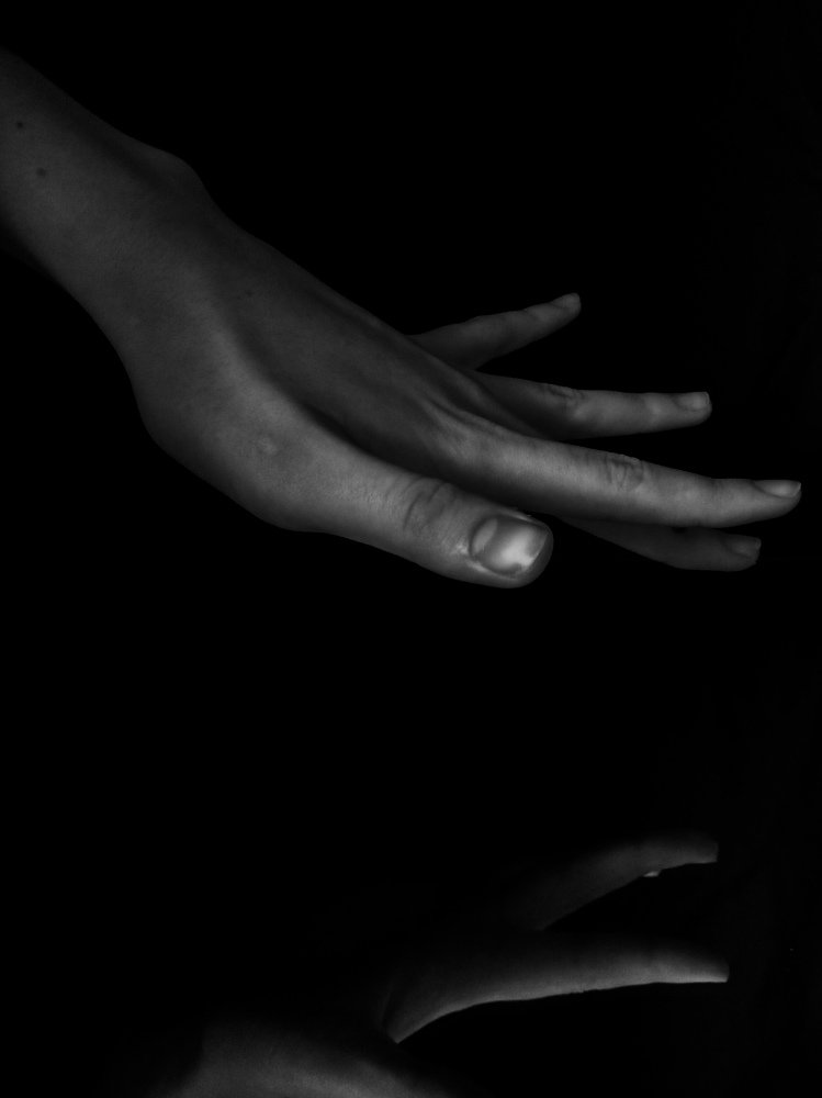hand of god in the mirror