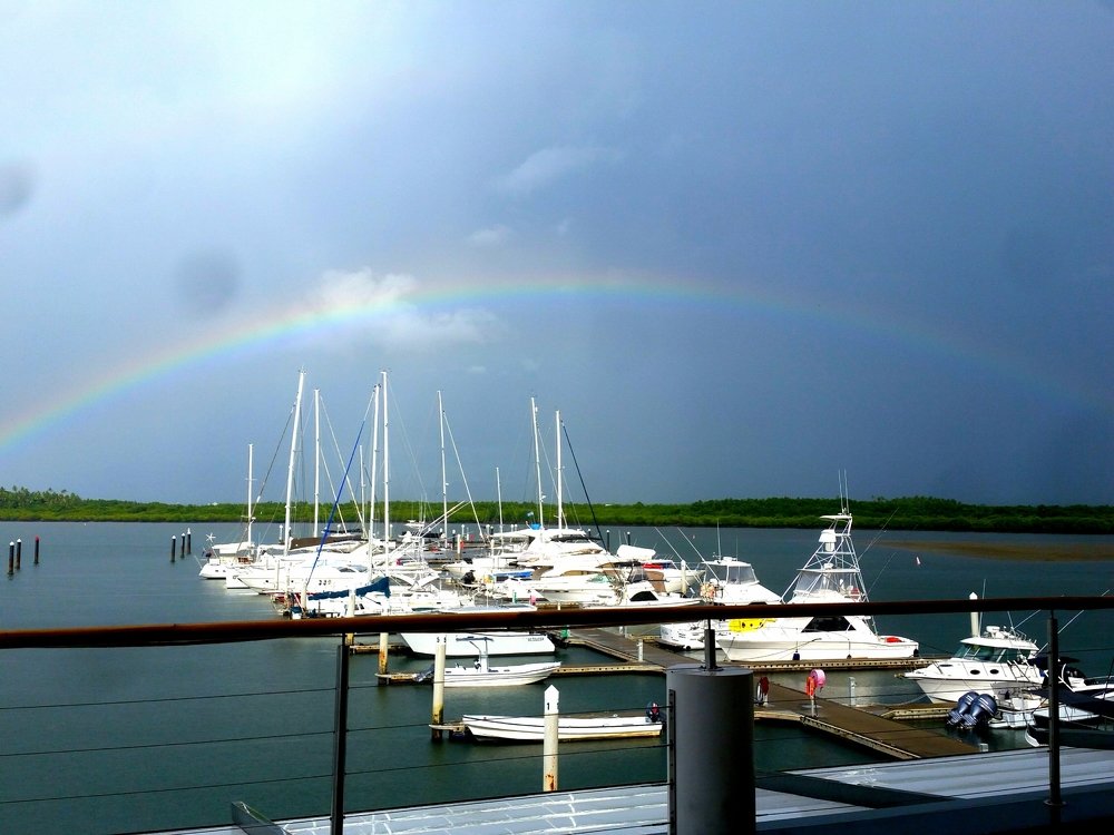 Rainbow over yachts