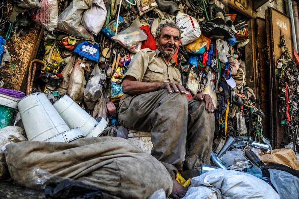 A #Palestinian Abu Naim Al Nashet ,75, Sitting in front of old a scrap #shop in #Gaza City on July 13, 2019.Photo by Mohammed Zaanoun #