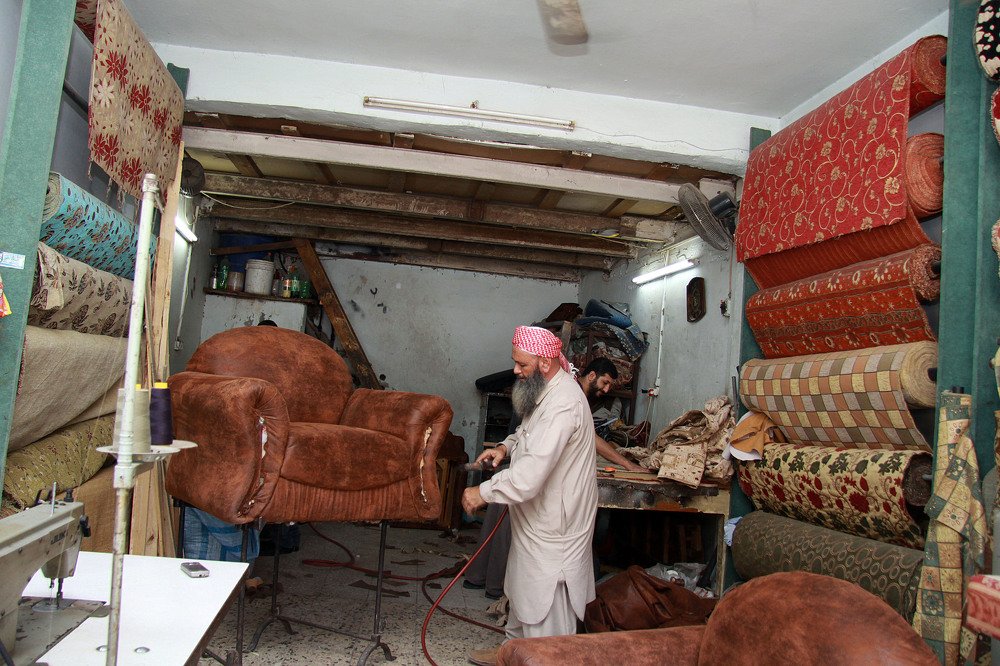 Dib Eljamal from Gaza is upholstery worker and owner of his upholstery shop where he revives old furniture and makes it new again.