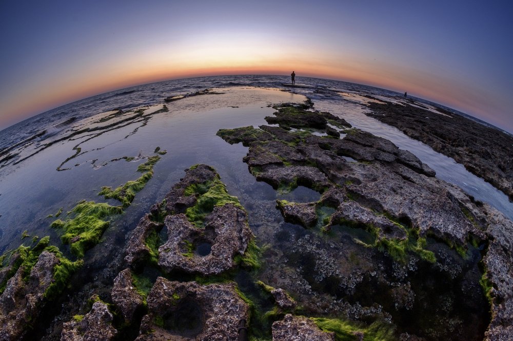 Fishermen on a sunset
