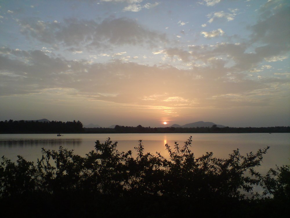 Sun Rise And Fisherman