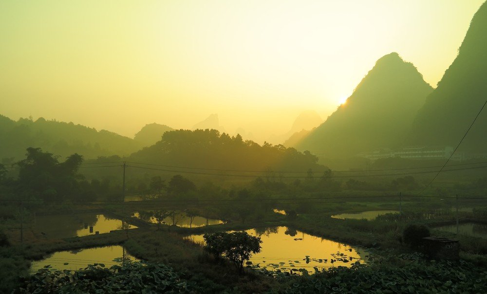 Рассвет в Янгшо, Китай