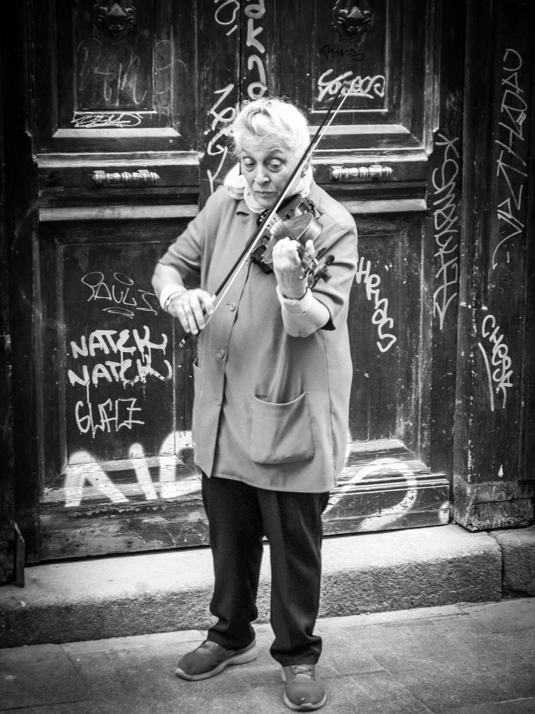 Old woman an hers Violin