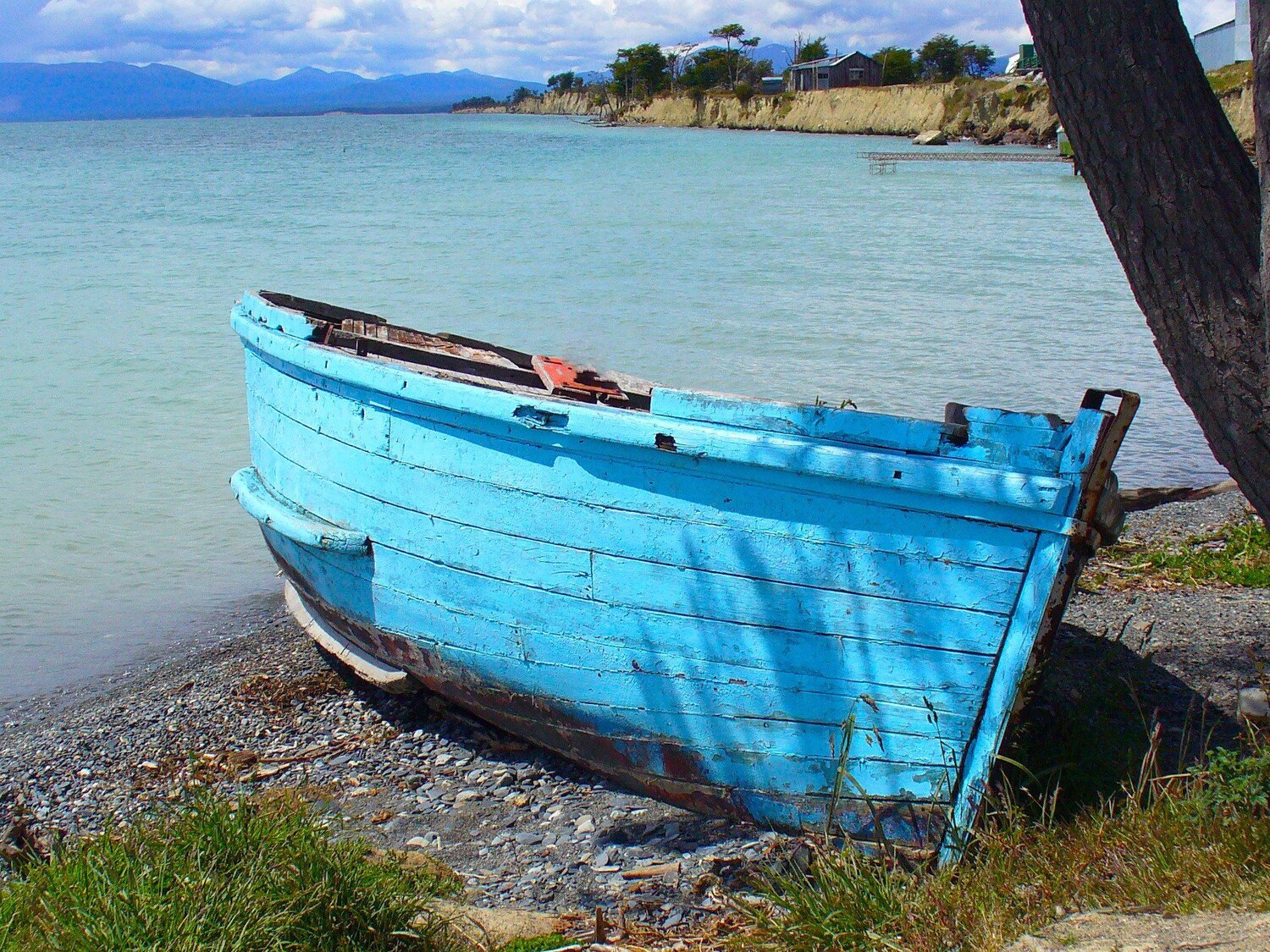 A blue wooden boat