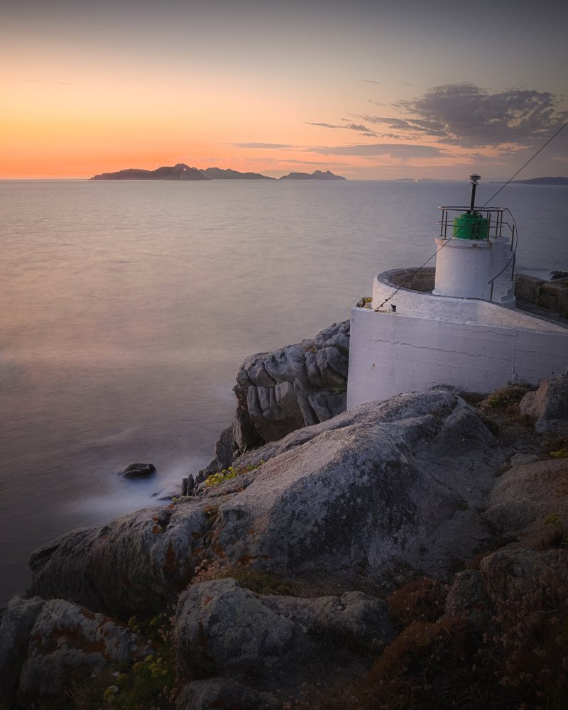 Sunset views behind a tiny lighthouse