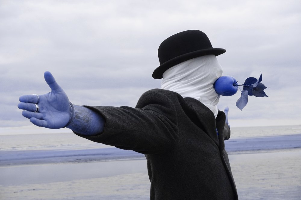 blue variation about the theme Rene Magritte "The Son of Man"