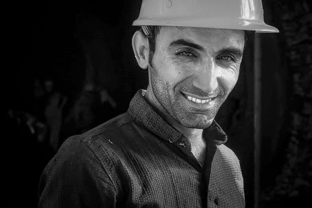 worker smile bw