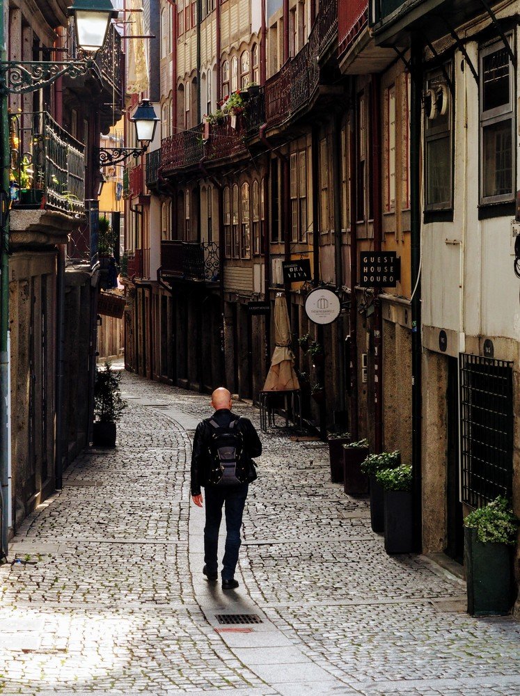 Walking alone on the streets of Porto