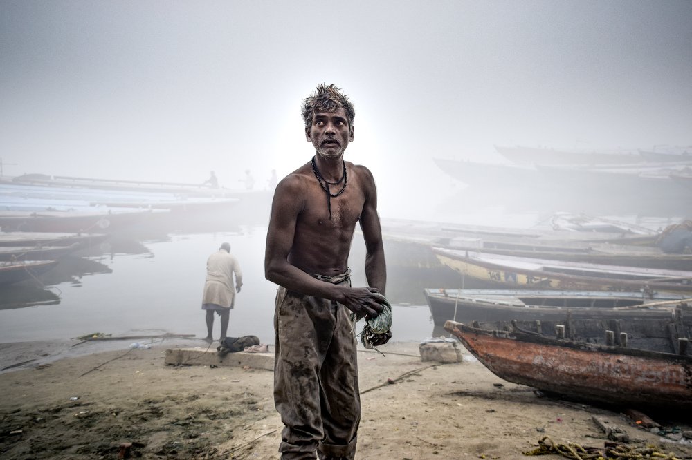 Man at bank of river