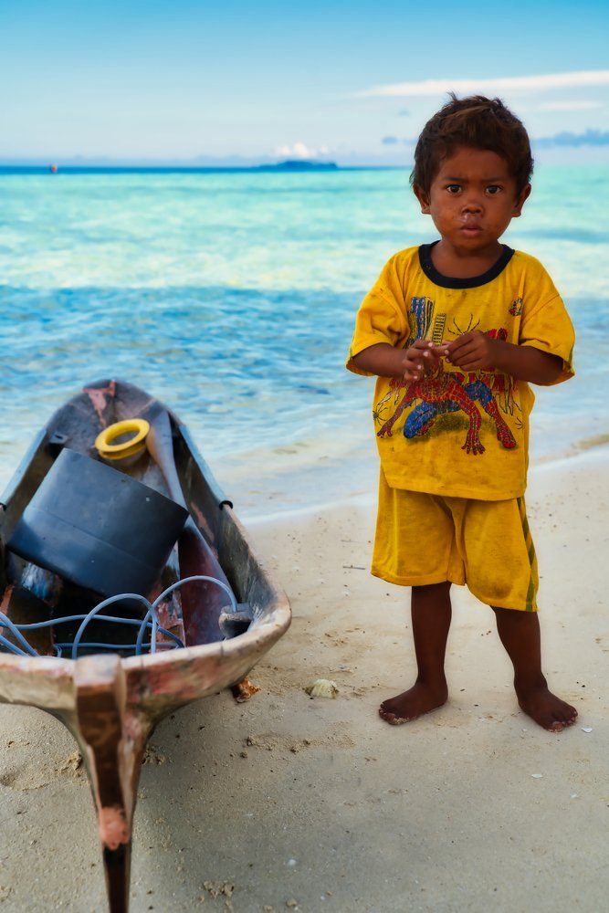 Boy And His (Father's) Boat