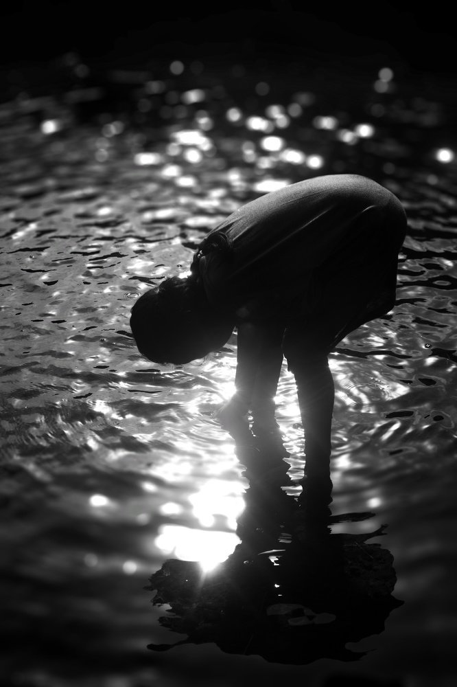 Ripple and Shadow of a Child in the Water