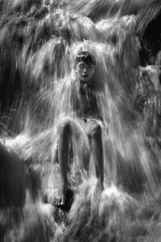 Little Boy With A Waterfall