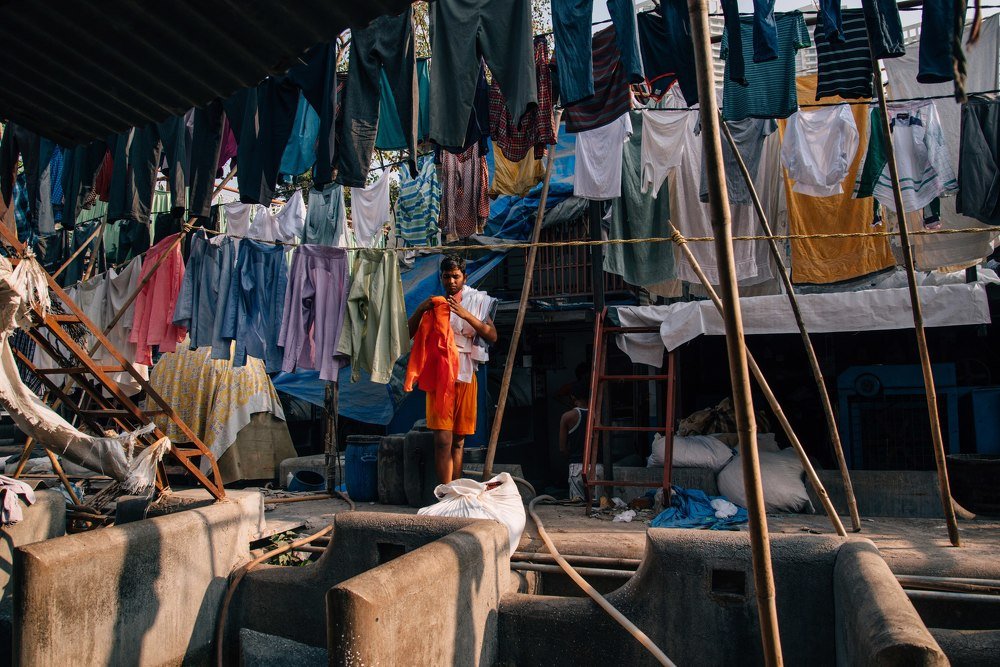 Работник в Dhobi Ghat (India)