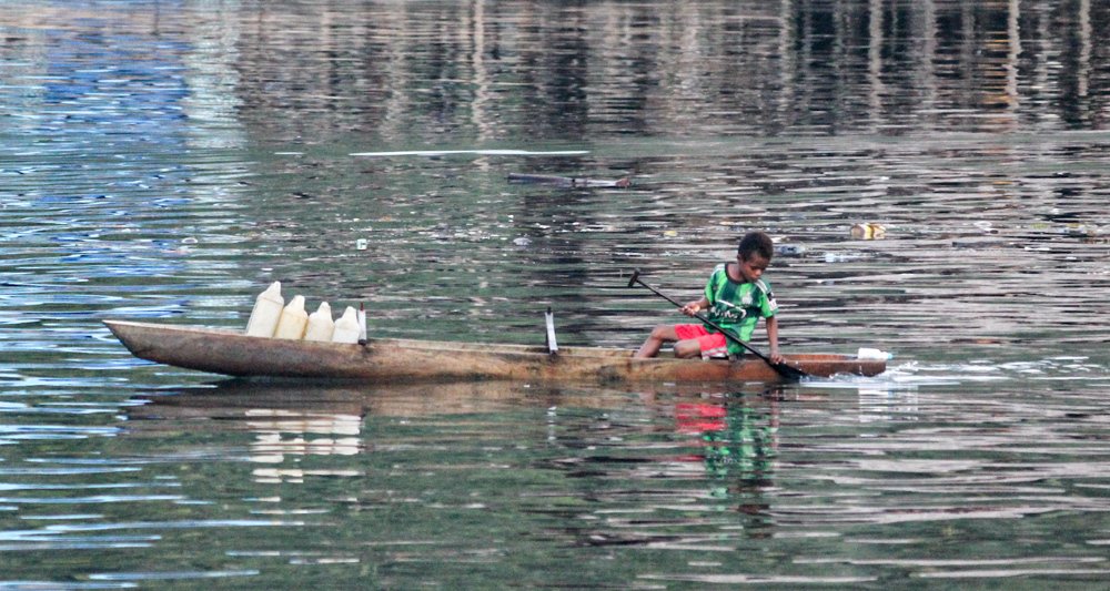 Rowing Clean Water |  Papuan children