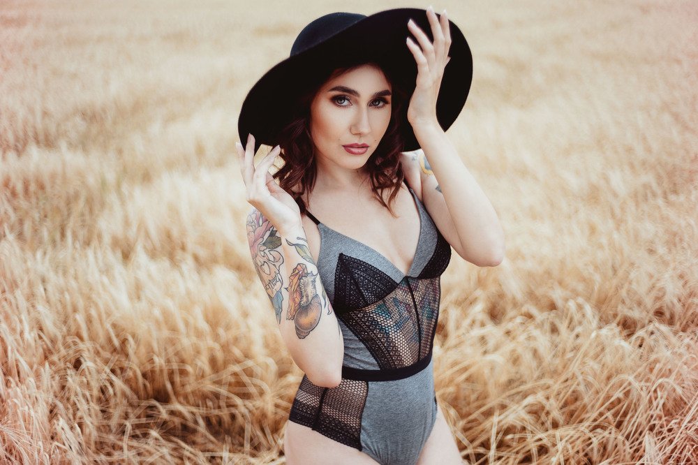 A woman with a black hat.